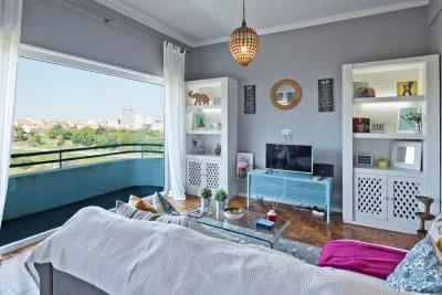 The living room - cosy up and enjoy the view from the couch. You can also head outside and watch the view from the balcony.