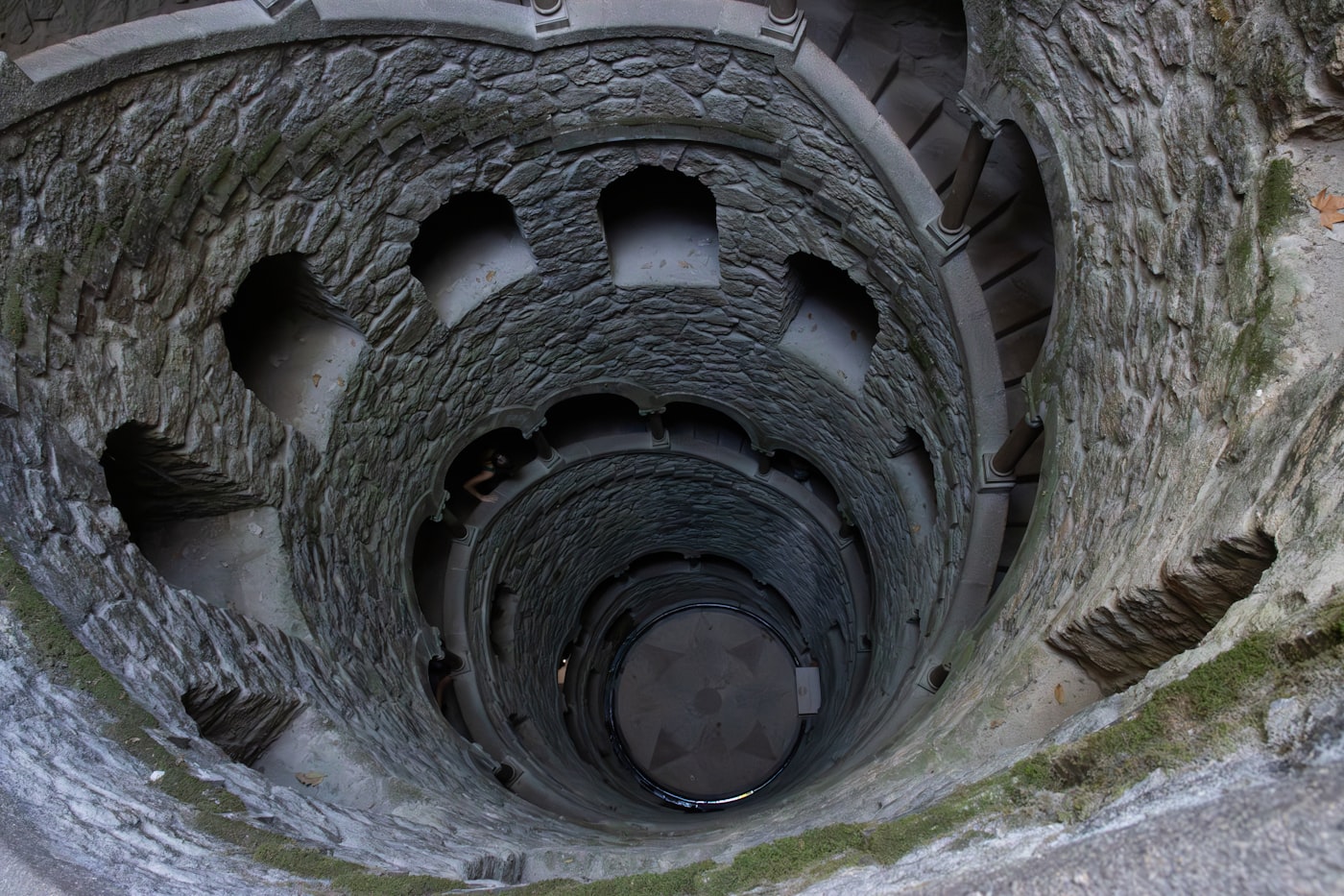 The Initiation Well at Quinta da Regaleira, a spiral staircase descending into the ground